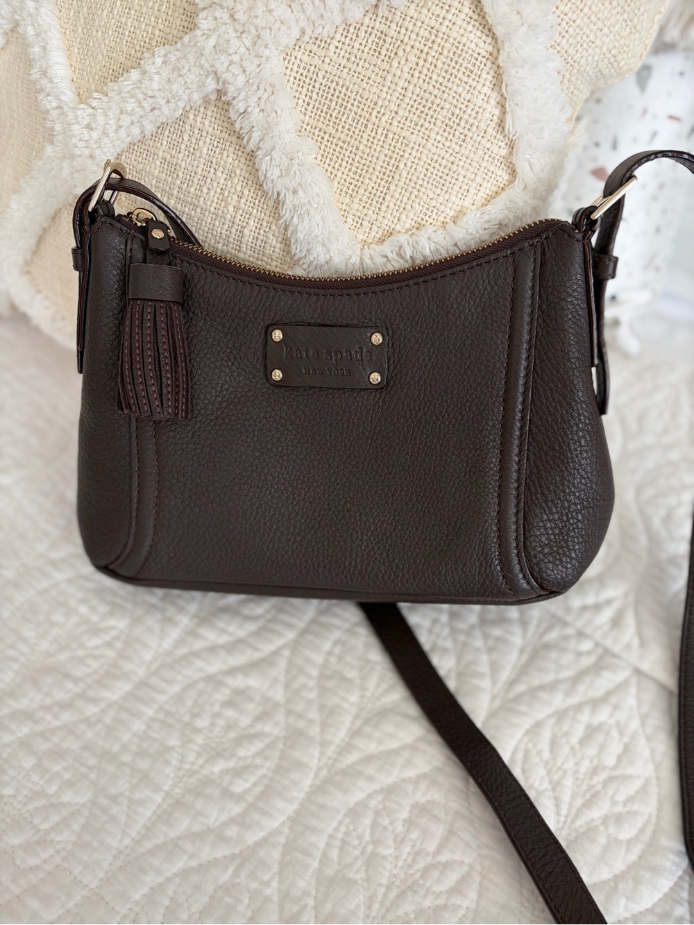 kate spade dark brown pebbled leather crossbody with tassel